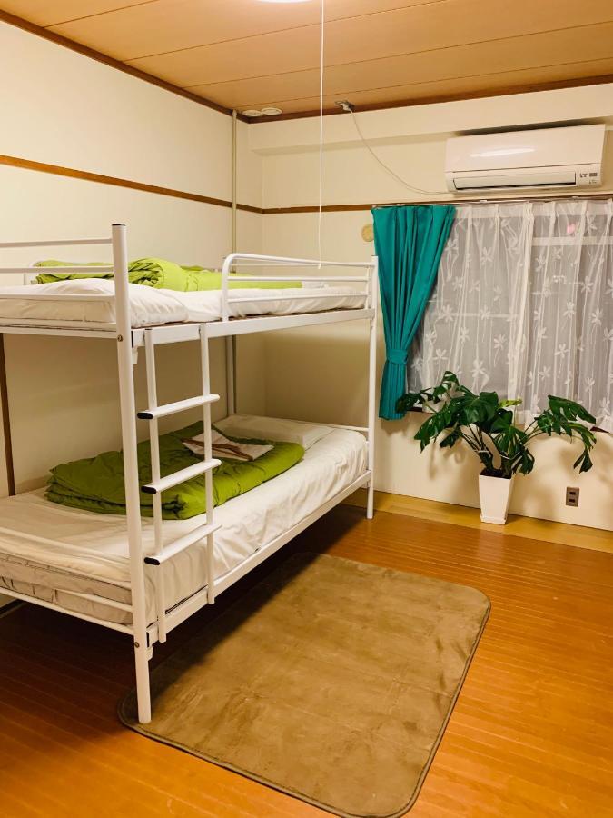 Guesthouse Shiawase Eki Фукуока Экстерьер фото